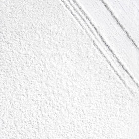 briogeo powder texture close-up showing fine starch and charcoal particles for oil absorption