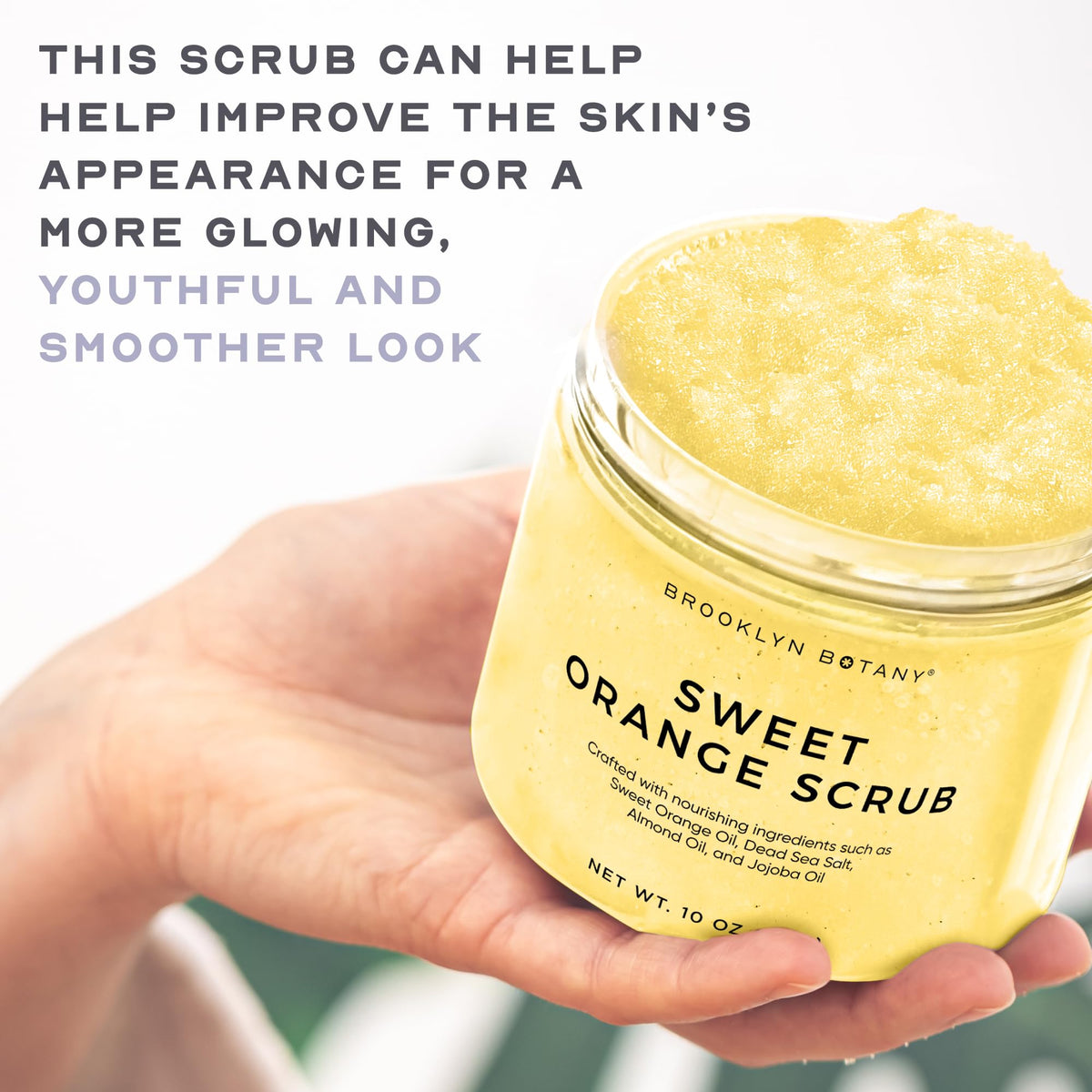 Hand scoop of Brooklyn Botany scrub being applied, demonstrates moisturization
