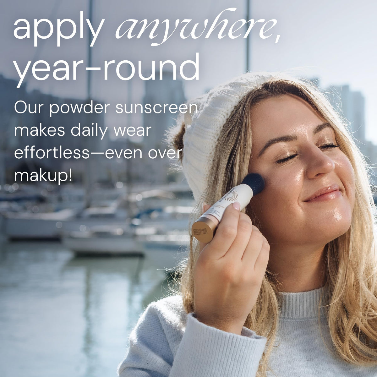 Brush On Block brush applying powder on face for matte protection