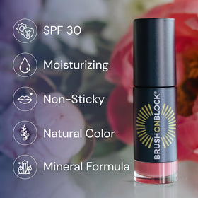 Brush On Block tube in hand for size and travel-friendly benefit