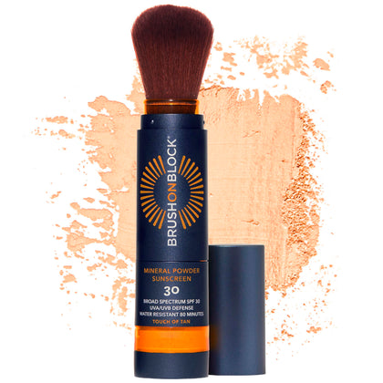 Brush On Block front packaging showing compact refillable brush for convenient SPF