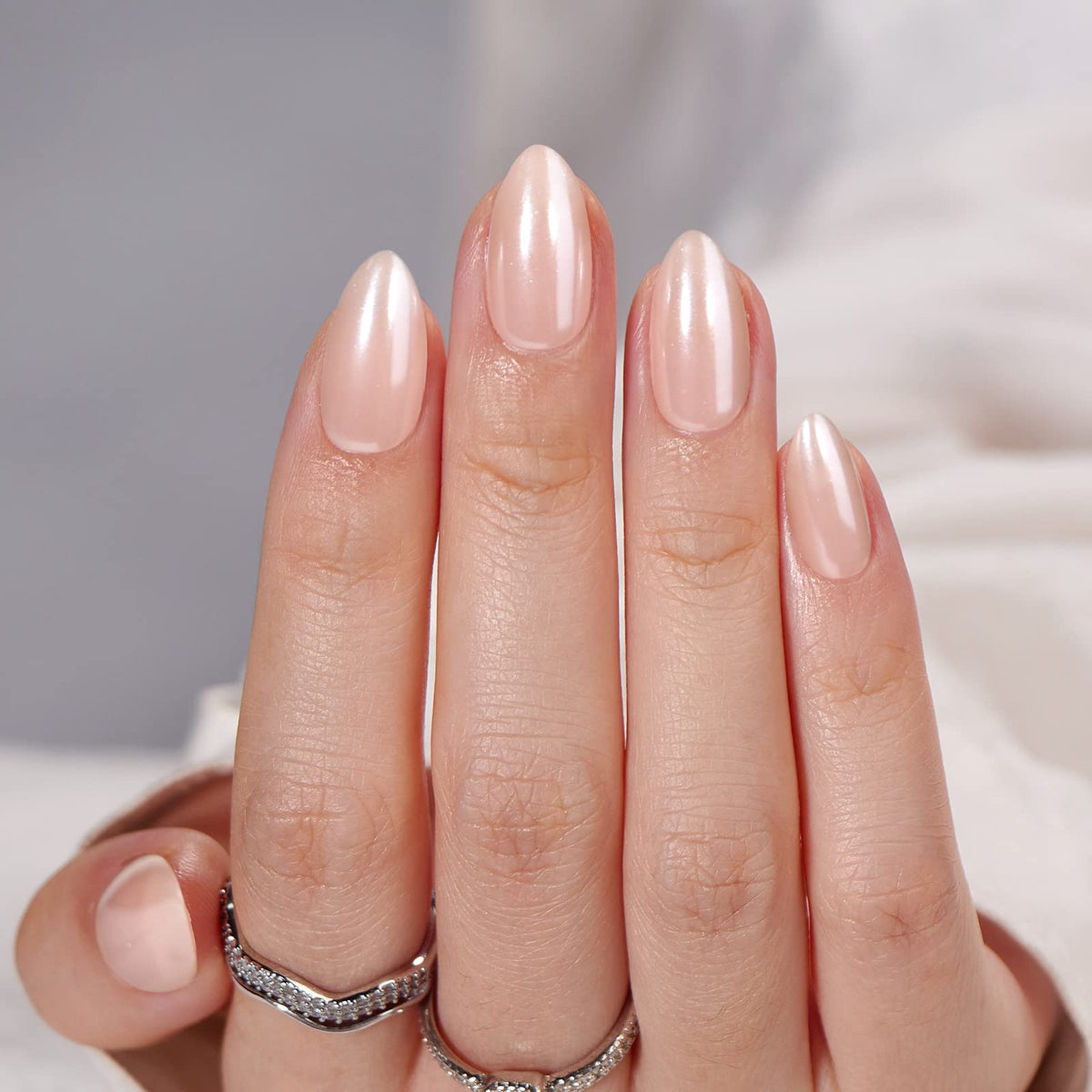 BTArtbox almond close-up showing gel polish layers and salon-like sheen benefit