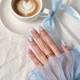 BTArtbox close-up of blue bow French-tip detail for polished look