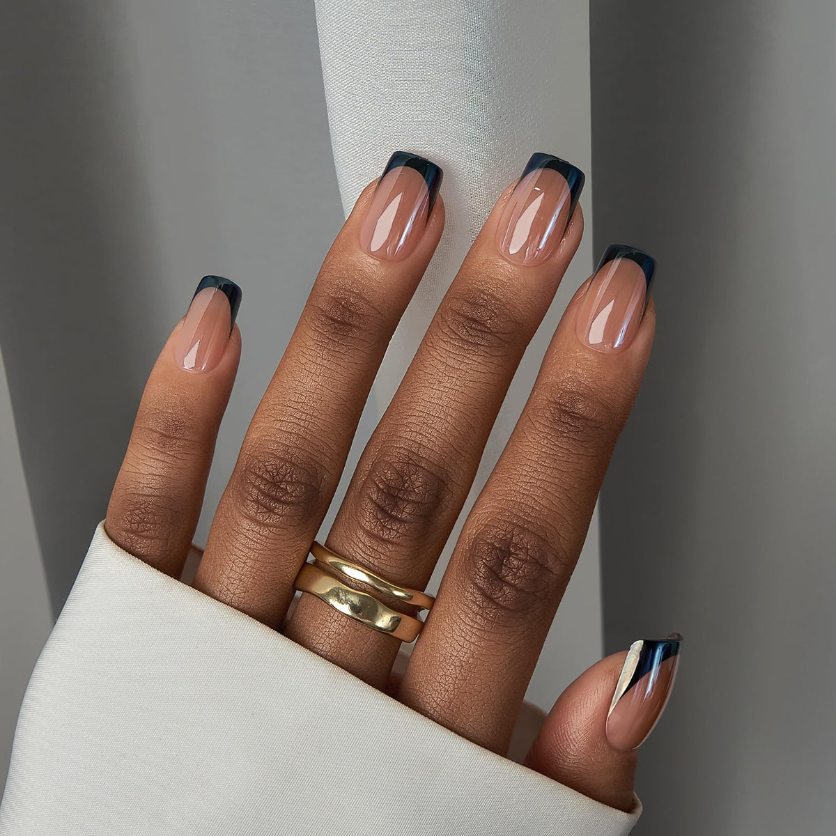 BTArtbox close-up of black chrome French tip showing gel shine and salon look benefit