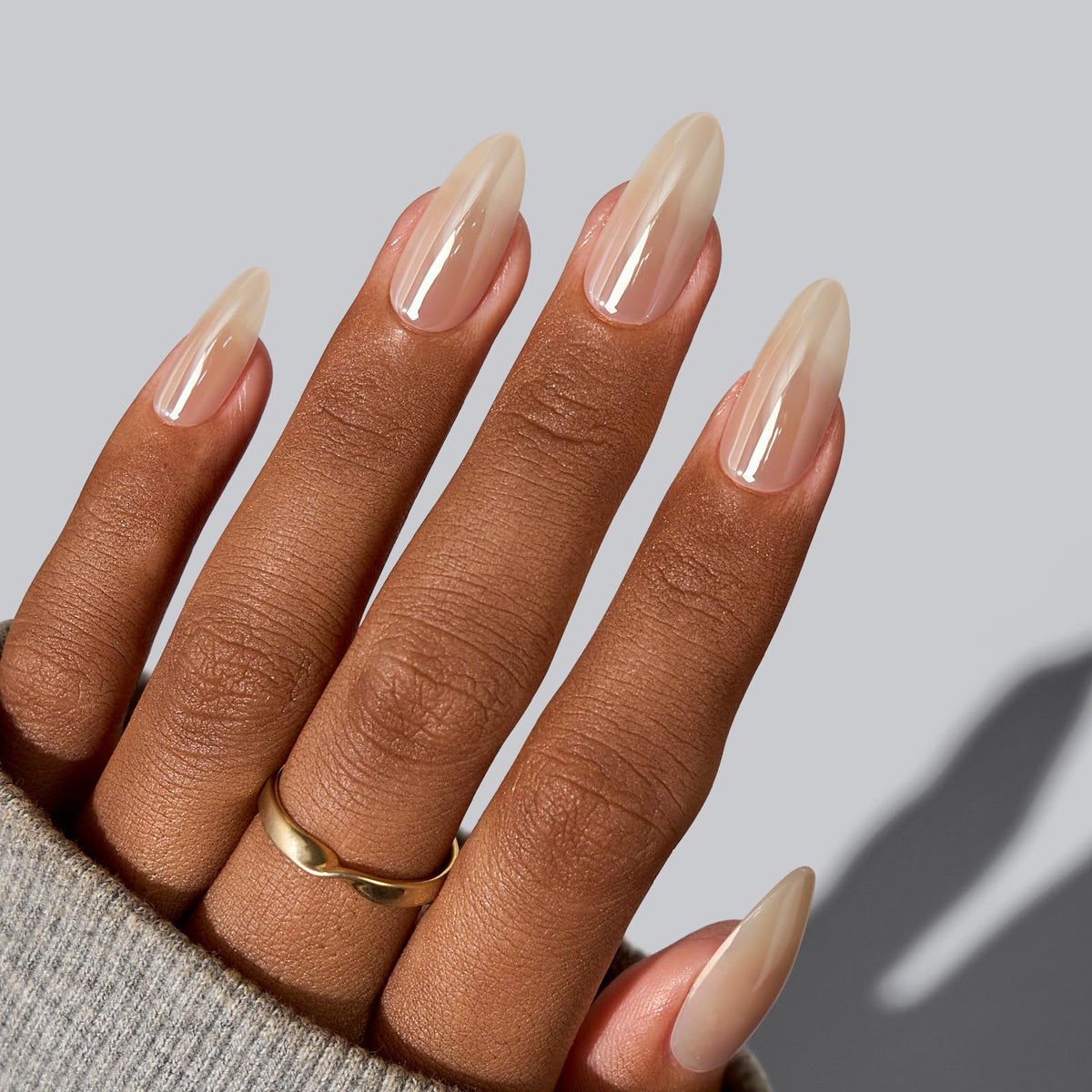 BTArtbox nails fitted on hand in lifestyle shot showing natural almond shape and wearability