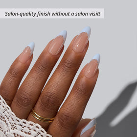 BTArtbox close-up of blue French tips highlighting precise line and shine