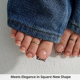 BTArtbox toenails in hand for scale showing multiple sizes for precise fit