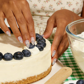 BTArtbox nails being applied with glue, demonstrating easy at-home use