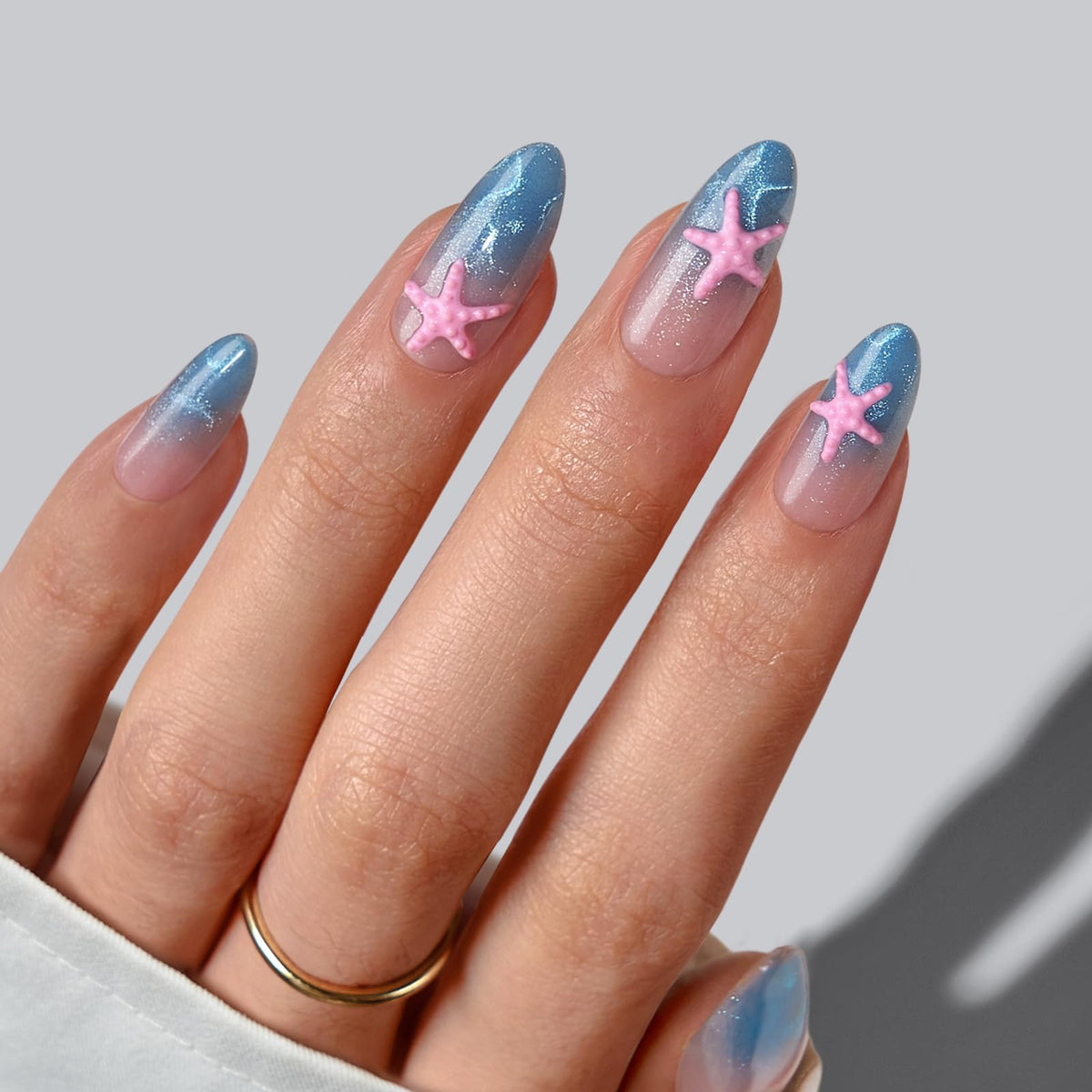 BTArtbox front packaging showing Star Shore blue cat eye almond nails and included kit