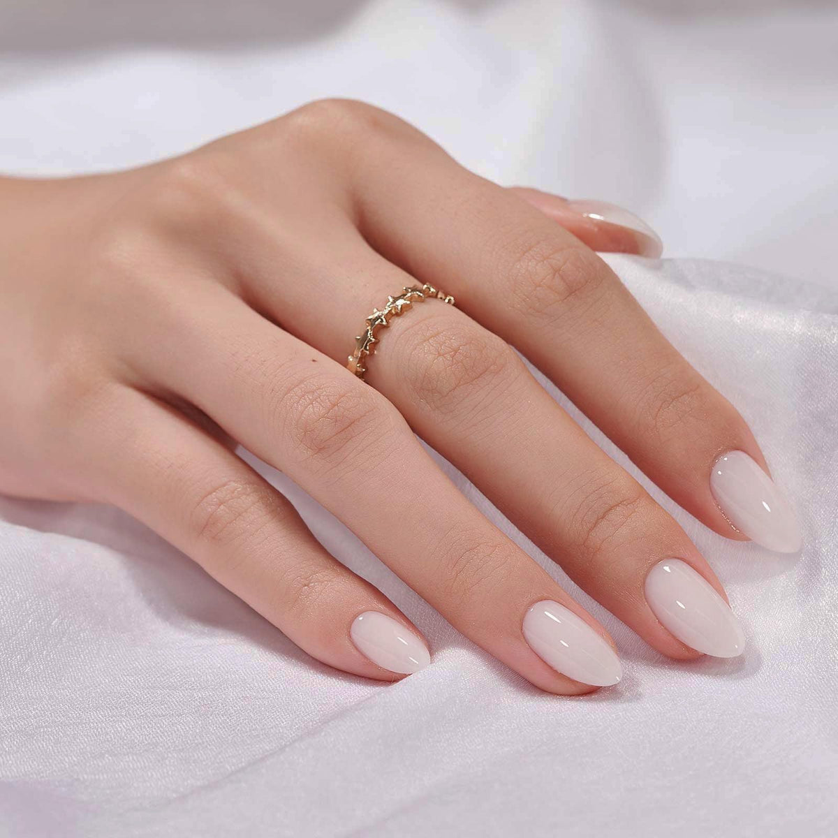 BTArtbox front set display showing clean white almond nails and instant polish