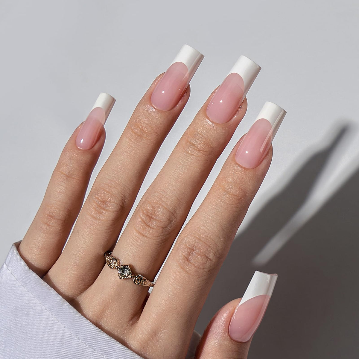 BTArtboxnails close-up of long square white tips highlighting clean edges