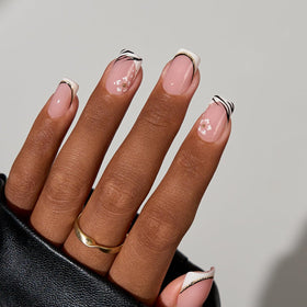 BTArtboxnails press-on nail being applied demonstrating quick at-home use