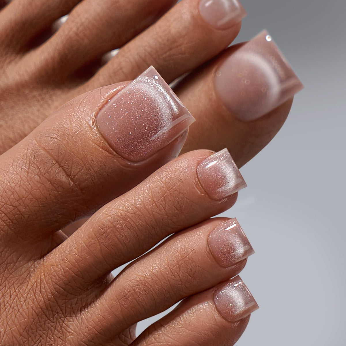 BTARTBOXNAILS press-on toes worn with sandals, displays long-lasting wearable benefit