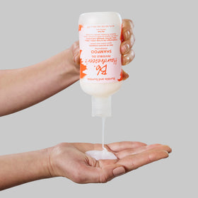 Bumble and bumble label close-up highlighting argan coconut grapeseed