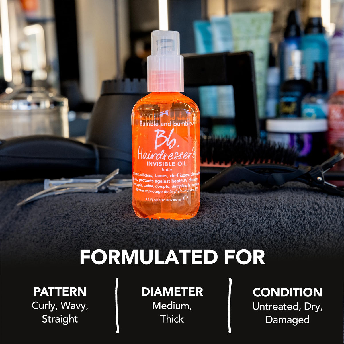 Bumble and bumble bottle beside styling tools demonstrating heat protection use