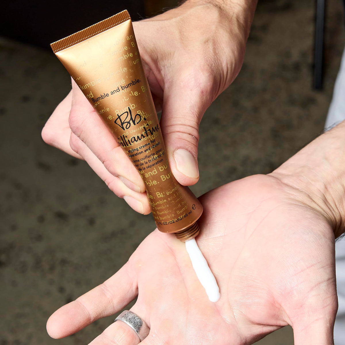 Bumble and bumble application on hands demonstrating small-amount control and easy use