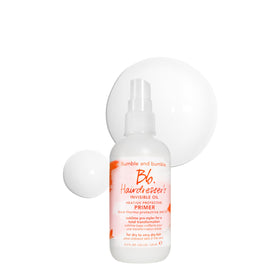 Bumble and bumble front packaging showing bottle and label, clear benefits