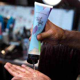 Bumble and bumble gel on fingers ready to apply for precise sculpting benefit
