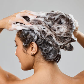 Bumble and bumble creamy lather close-up demonstrating soft cleanse benefit