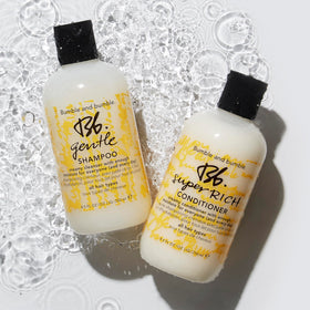 Bumble and bumble shampoo lathering in shower offering gentle daily cleansing benefit
