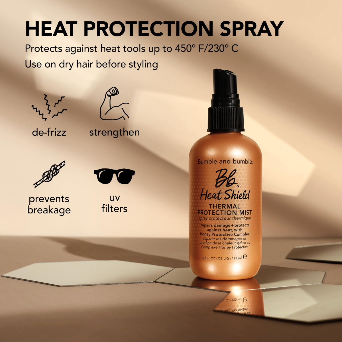 Bumble and bumble held in hand to show mini 2 fl oz travel-size convenience