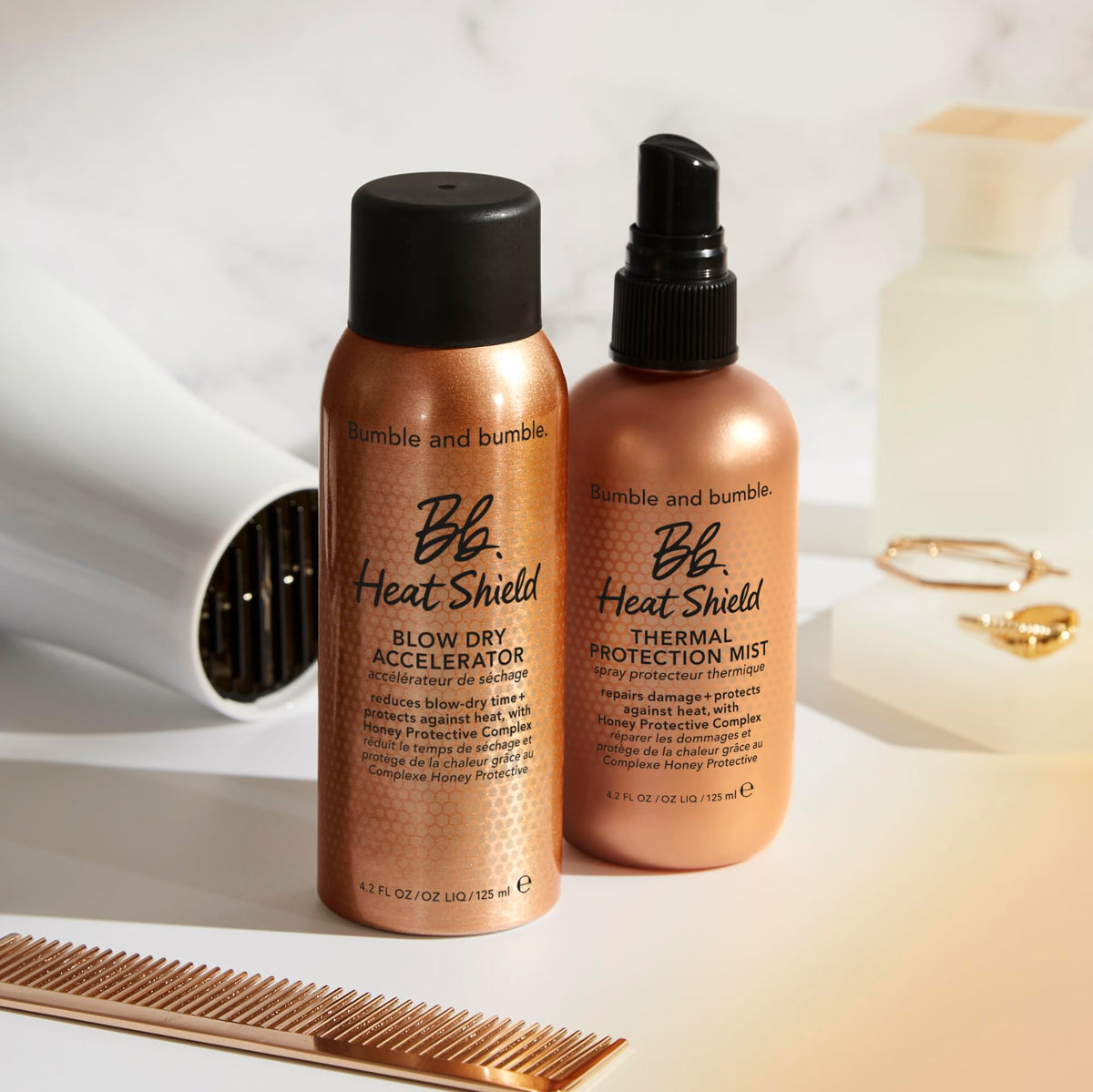 Bumble and bumble bottle next to ruler showing 4.2 fl oz size and travel-friendly