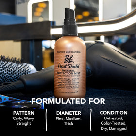 Bumble and bumble being used with a blow dryer to protect strands during styling