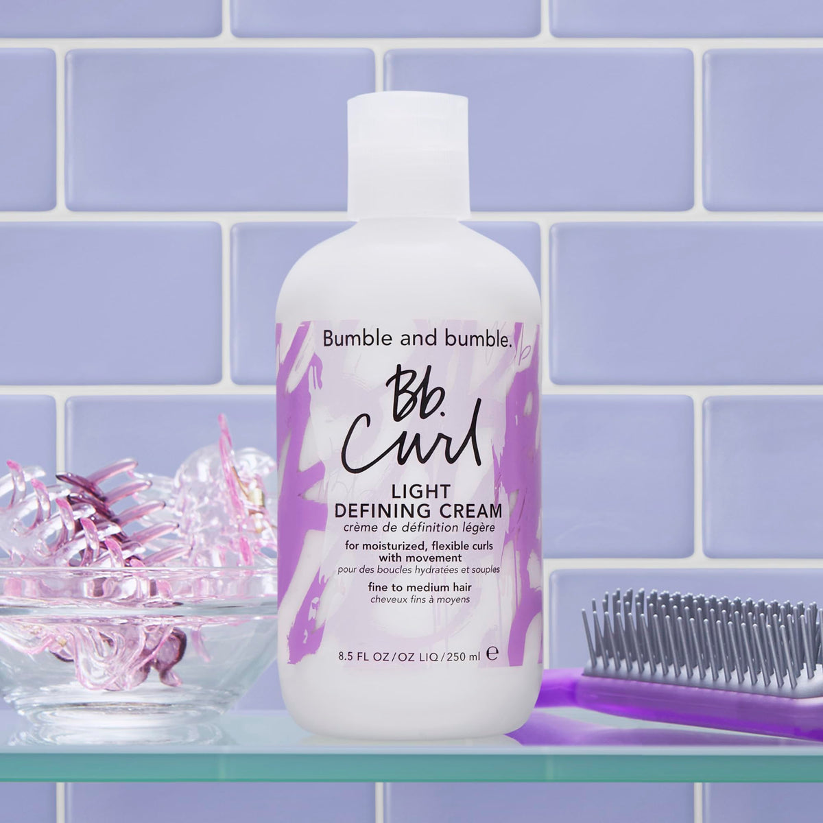 Bumble and bumble ingredient display with jojoba avocado coconut oils benefits