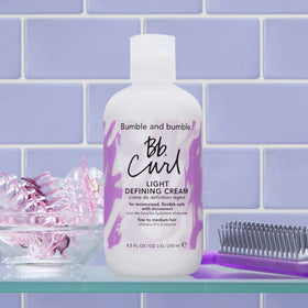 Bumble and bumble ingredient display with jojoba avocado coconut oils benefits