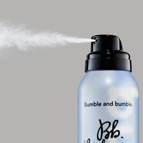 Bumble and bumble product in hand illustrating compact size