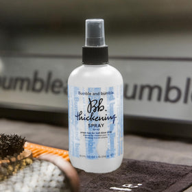 Bumble and bumble spraying roots to show targeted lift and root volume