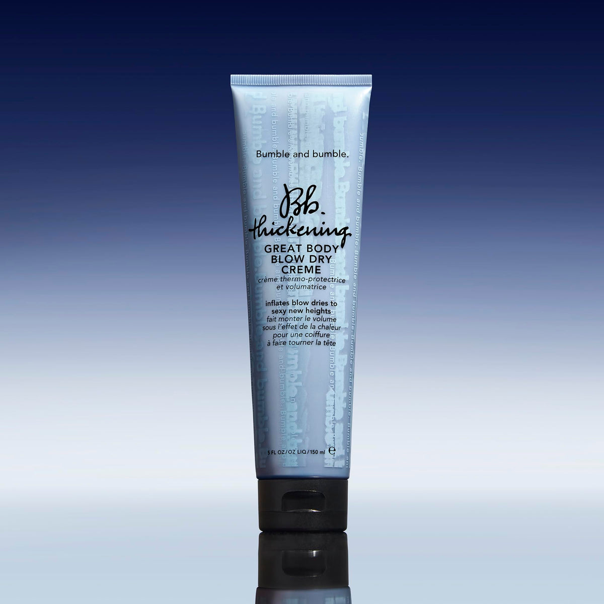 Bumble and bumble 5 fl oz tube beside hand for product scale