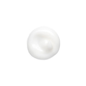 Bumble and bumble styling cream applied to hand demonstrating easy distribution