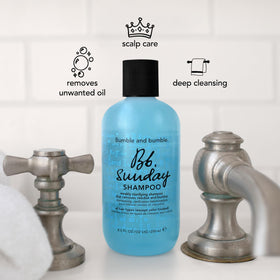 Bumble and bumble bottle on bathroom shelf showcasing tidy storage and styling routine