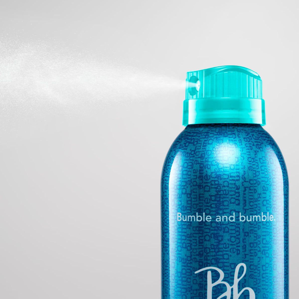 Bumble and bumble texture close-up showing soft, touchable hair finish and shine benefit