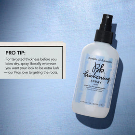 Bumble and bumble mist on damp hair adding texture for easier styling