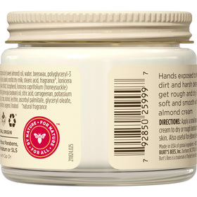 Burt's Bees cream beside cotton gloves suggesting overnight repair and enhanced absorption