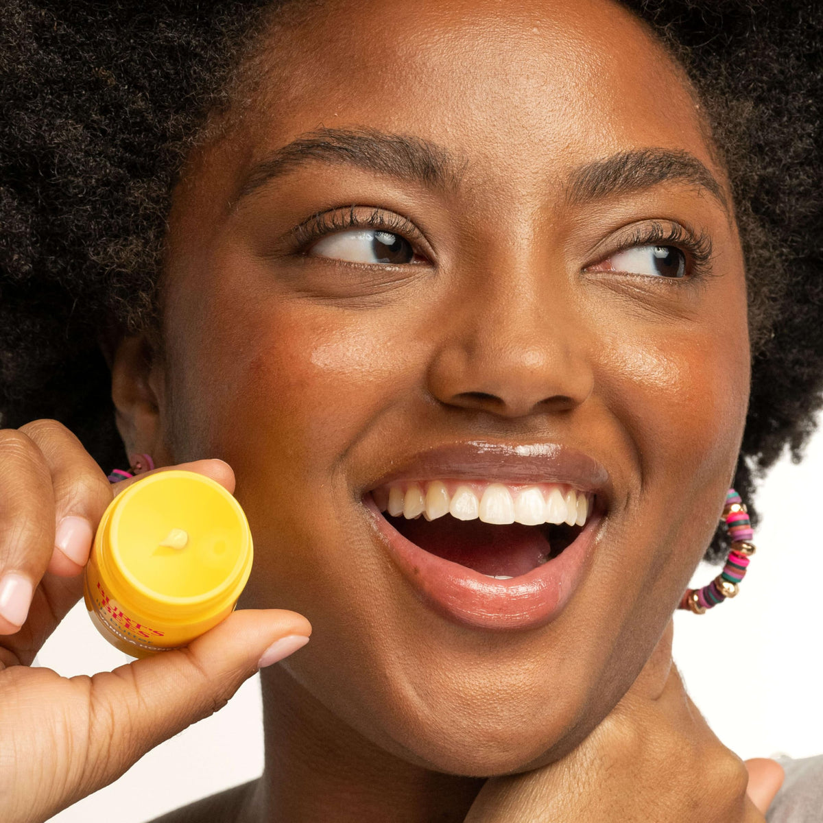 Burt's Bees beeswax and natural butters detail highlighting protective barrier
