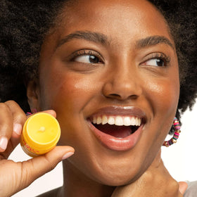 Burt's Bees beeswax and natural butters detail highlighting protective barrier