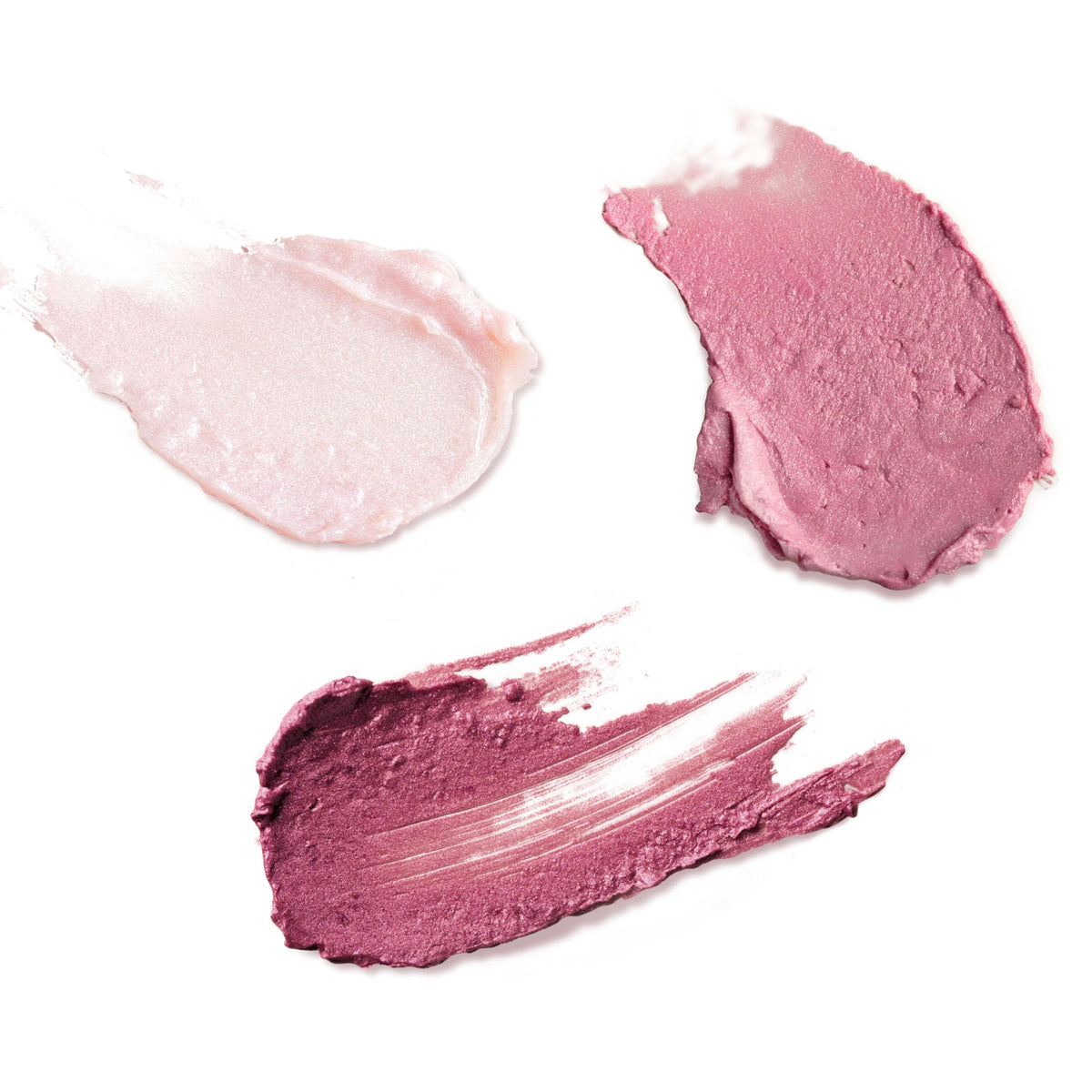 Burt's Bees Champagne swatch on wrist showing soft pink luminous finish
