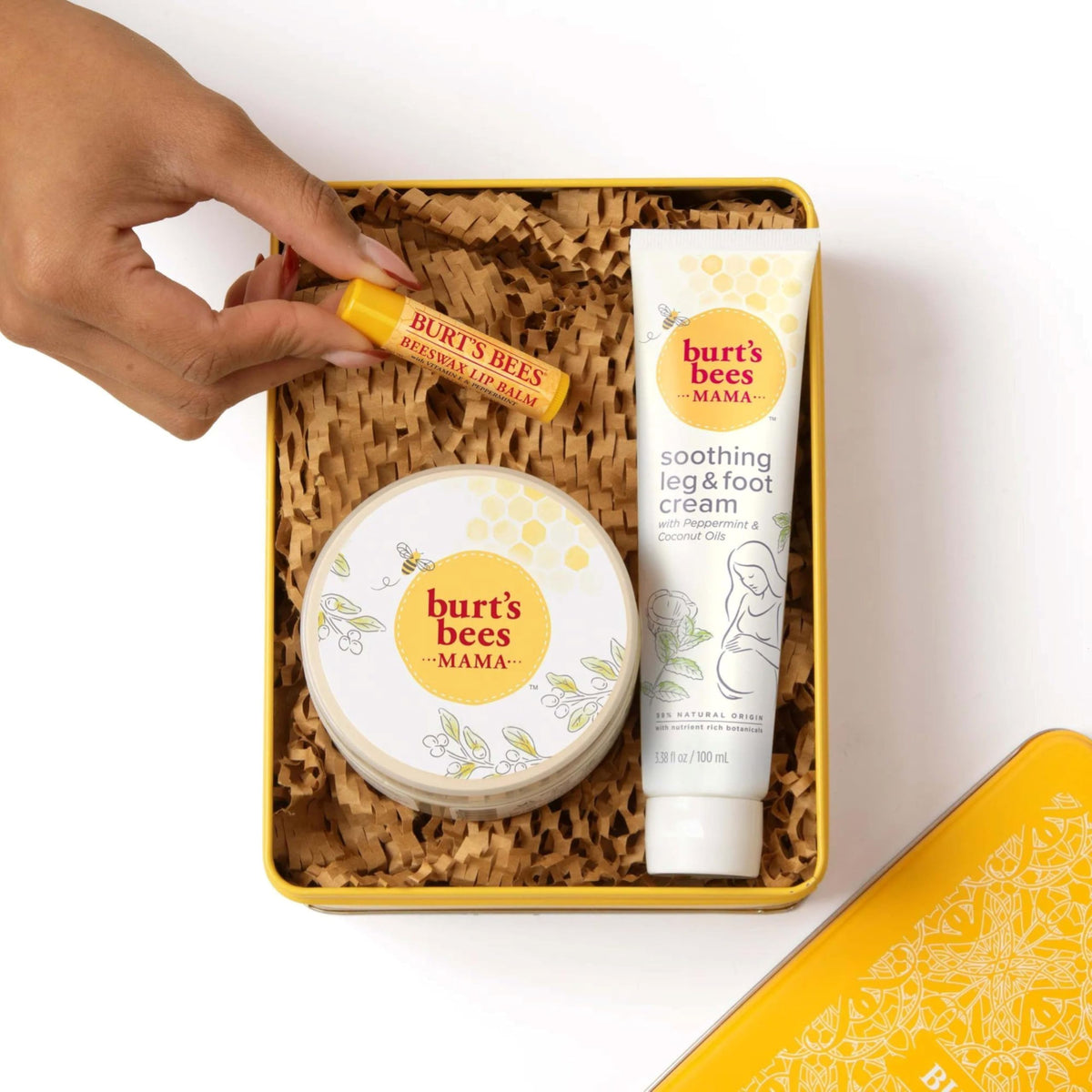 Burt's Bees leg cream rubbed into foot for softening tired feet