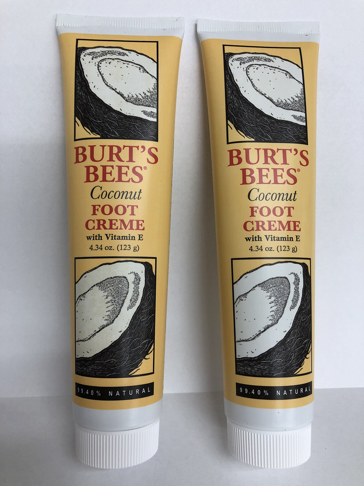 Burt's Bees foot creme applied to feet on a towel demonstrating smooth, softened heels