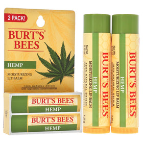 Burt's Bees lip balm next to a coin to show 2 oz scale and portable nourishment