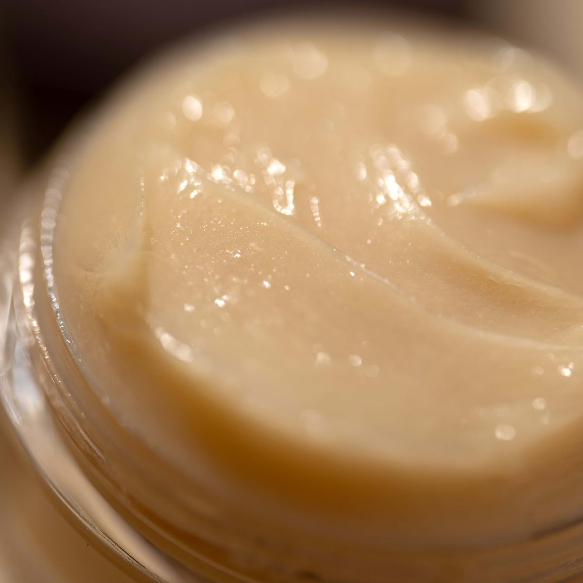 Burt's Bees jar on bedside table suggesting easy nightly routine benefit