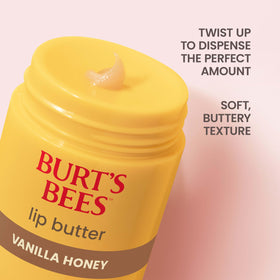 Burt's Bees 0.5 oz tube next to a coin for size comparison and portability benefit