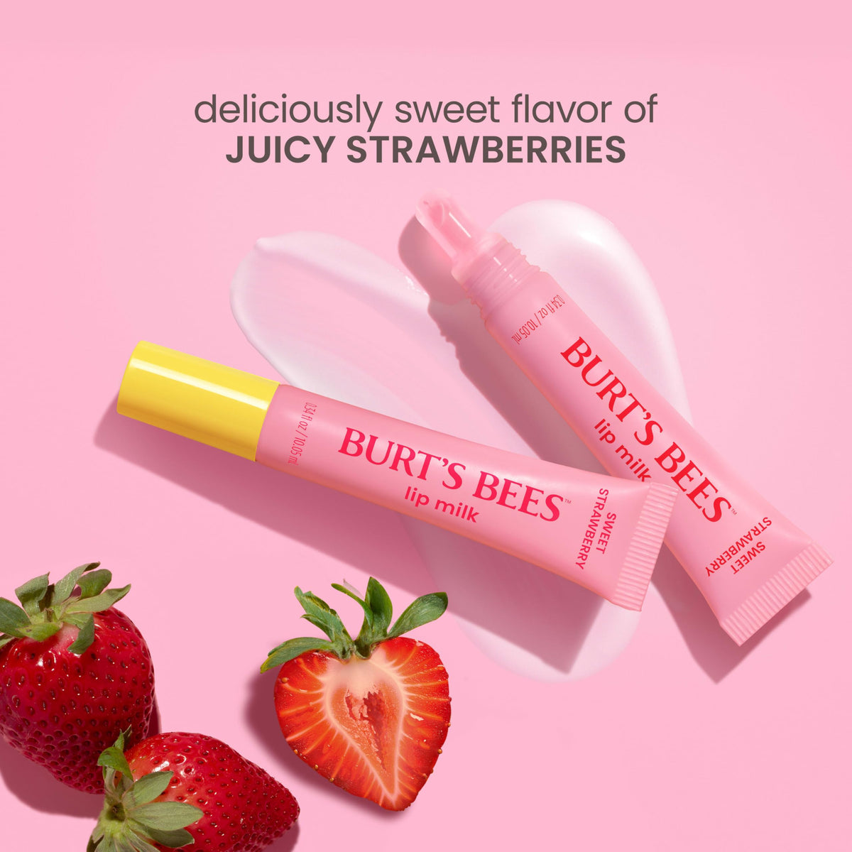 Burt's Bees tube beside fresh strawberries emphasizing pleasant flavor
