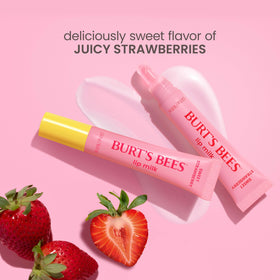 Burt's Bees tube beside fresh strawberries emphasizing pleasant flavor