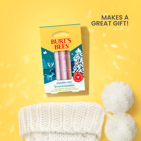 Burt's Bees three lip shimmer tubes displayed for shade comparison benefit