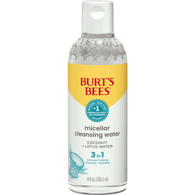 Burt's Bees 8 oz bottle held in hand for size and travel convenience