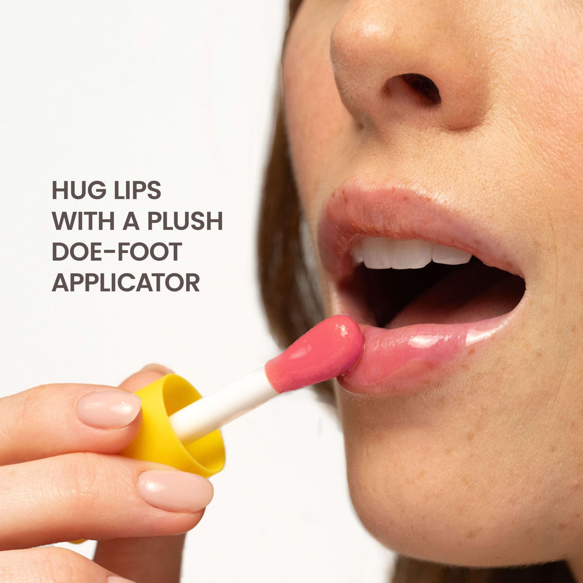 Burt's Bees size comparison of 0.15 oz tube fitting in palm